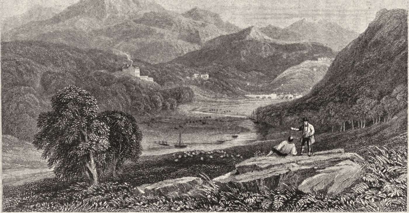 Engraving of the Vale of Ffestiniog in North Wales: two walkers rest on rocks above a river valley with boats, a house among the woods and mountains beyond